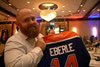Derek McEwan poses with his new autographed Eberle jersey, which he purchased in the auction.